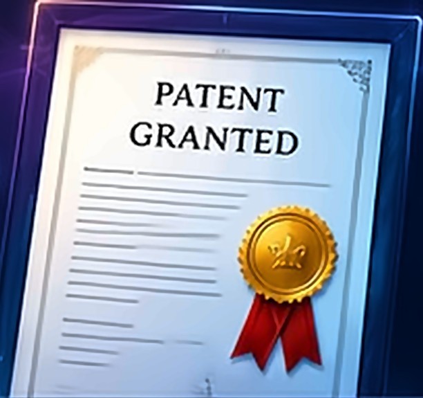 Patent Granted certificate with gold seal and red ribbon